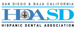 The image displays a logo with text that reads SAN DIEGO BAYA CALIFORNIA HSD followed by an acronym HSD, which stands for Hispanic Dental Association, and below that, HISPANIC DENTAL ASSOCIATION. The logo is accompanied by a graphic element resembling a wave or a stylized letter D.